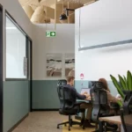 Winger Ergonomic Workspace Office Mesh Chair with Headrest in Black at Waterman Clayton Coworking Space